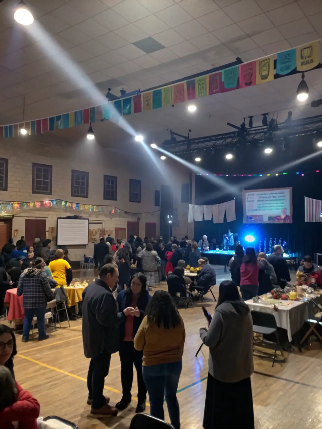A vibrant image of a cultural event organized by FELLETIN THE JOY OF READING, showcasing community members engaged in literary activities.